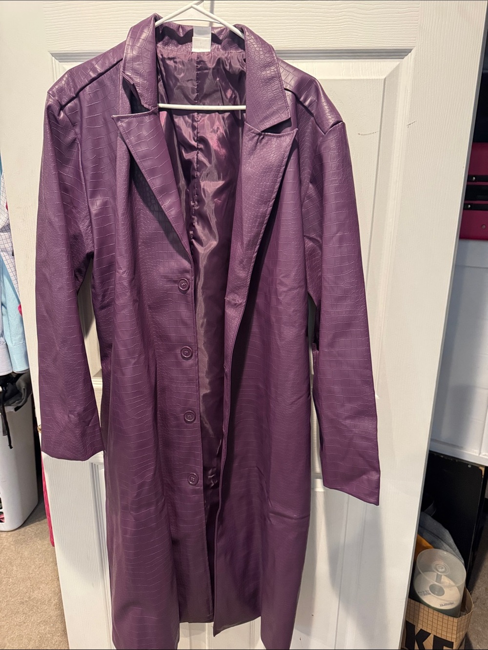 The JOKER Halloween  Long Purple Faux Leather Trench Coat from Spirit